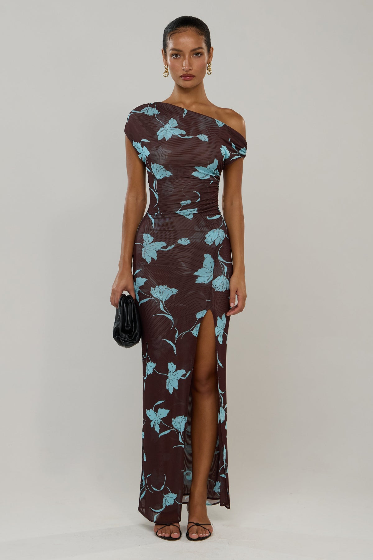 This is an image of Gwen Dress in Agave - RESA featuring a model wearing the dress
