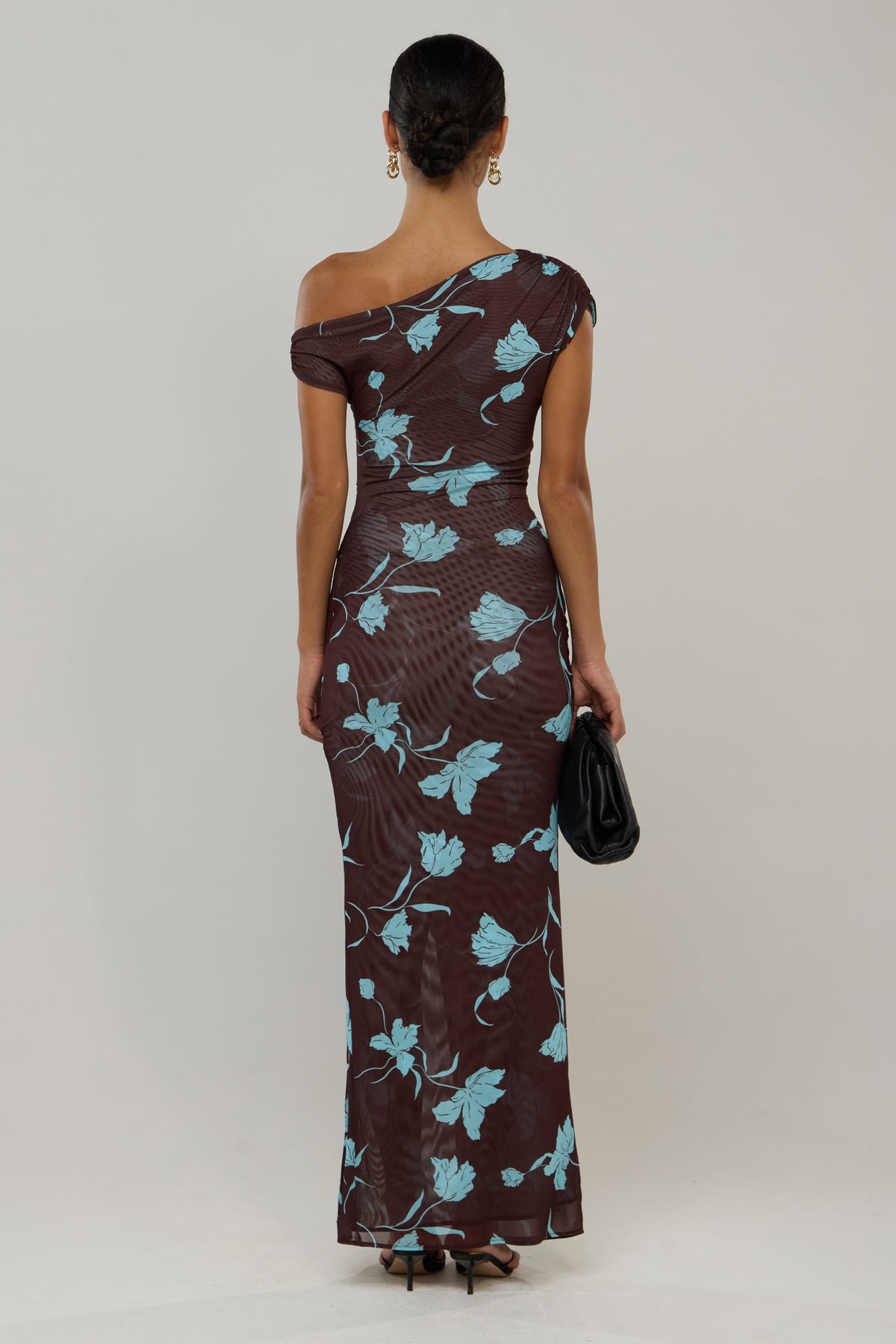 This is an image of Gwen Dress in Agave - RESA featuring a model wearing the dress