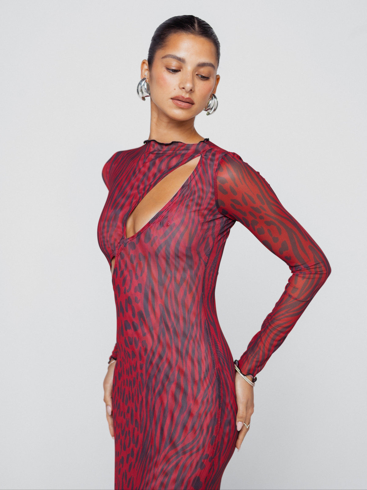 This is an image of Holly Maxi in Vixen - RESA featuring a model wearing the dress