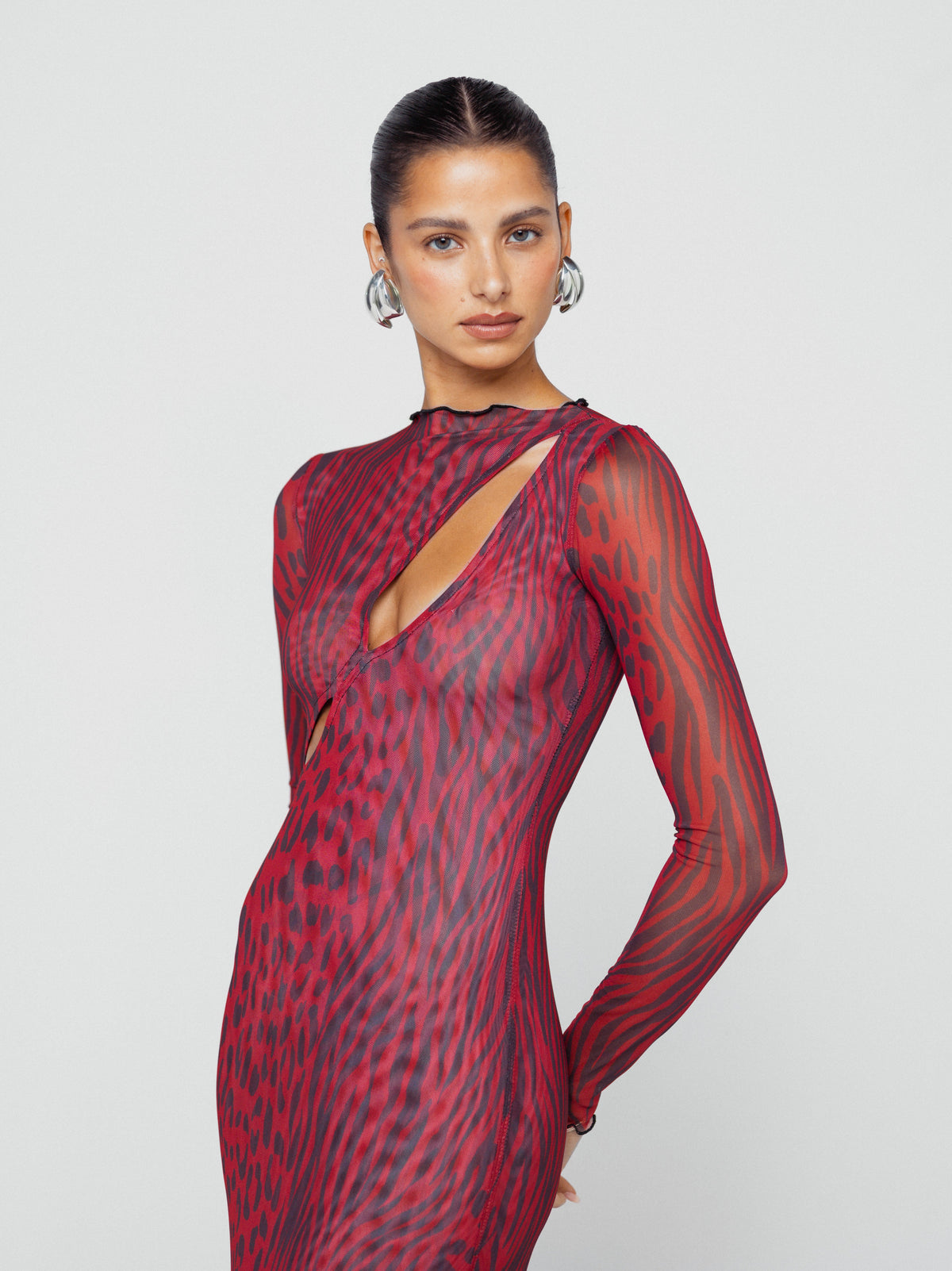 This is an image of Holly Maxi in Vixen - RESA featuring a model wearing the dress