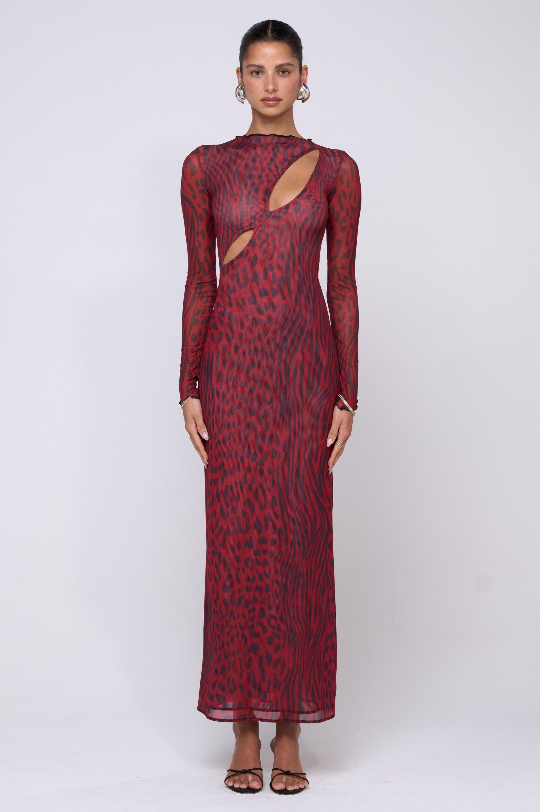 This is an image of Holly Maxi in Vixen - RESA featuring a model wearing the dress