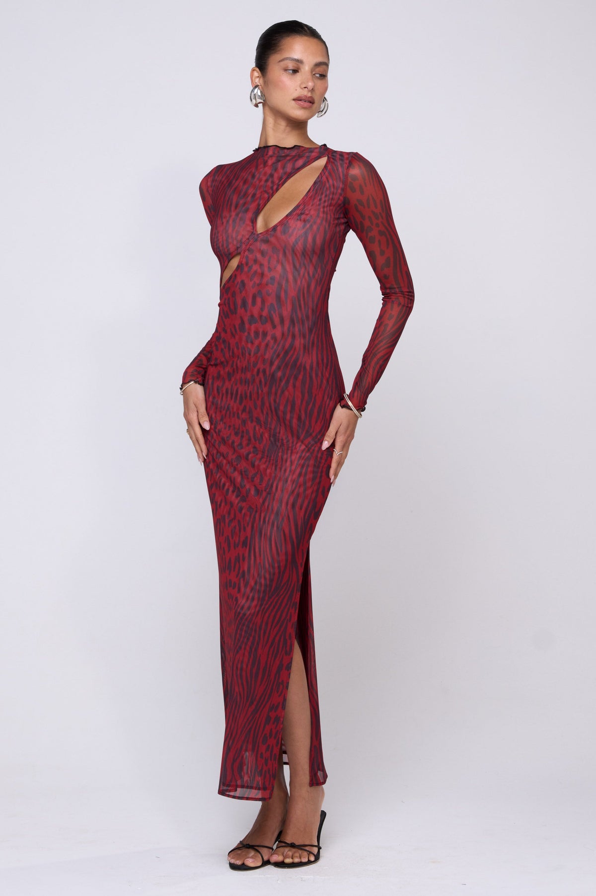 This is an image of Holly Maxi in Vixen - RESA featuring a model wearing the dress