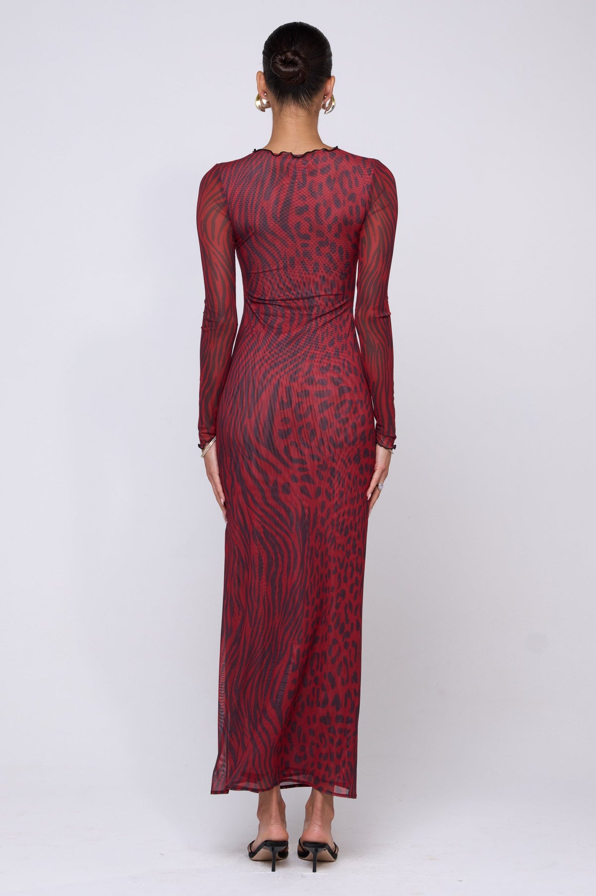This is an image of Holly Maxi in Vixen - RESA featuring a model wearing the dress