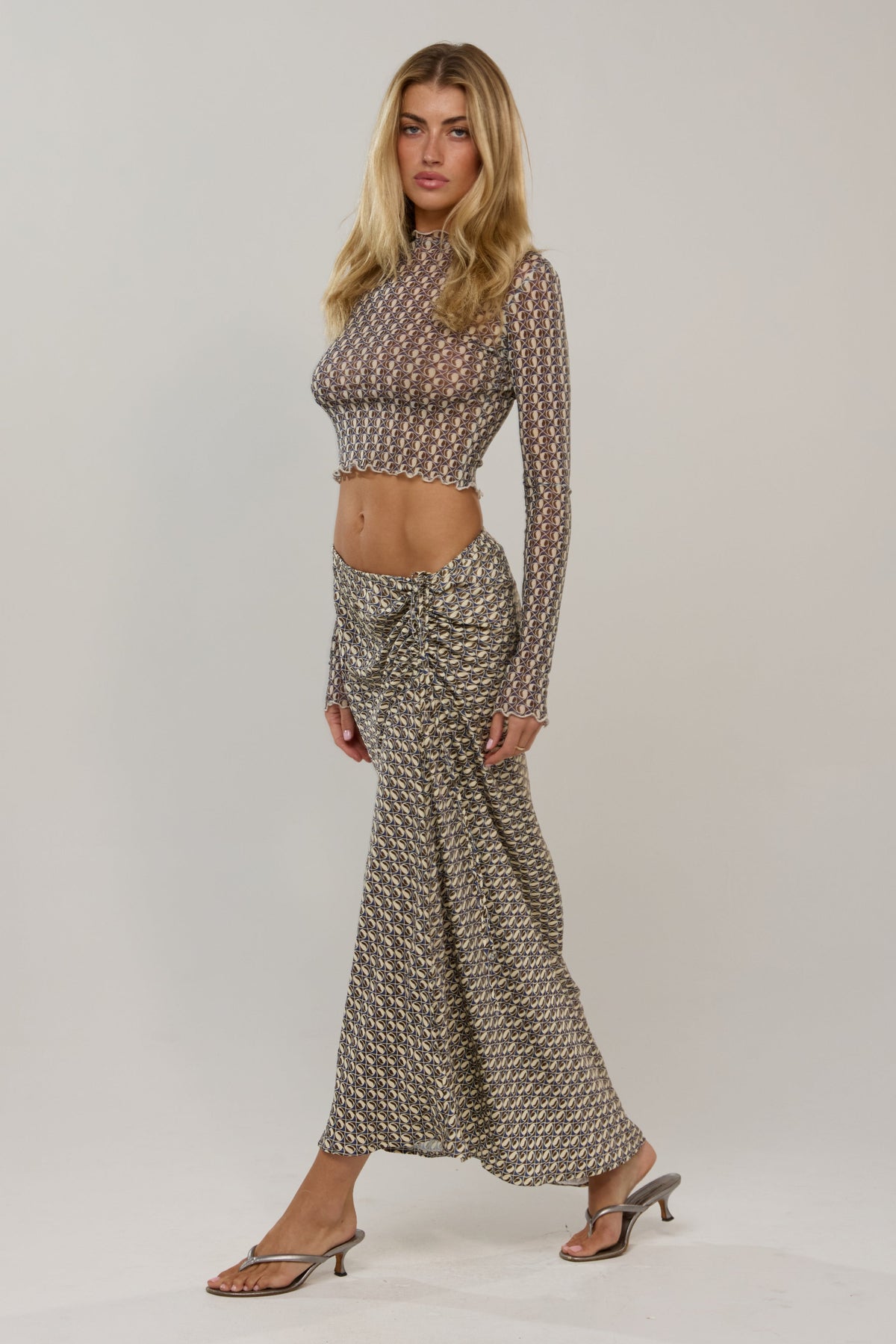 This is an image of Ida in Prism - RESA featuring a model wearing the dress