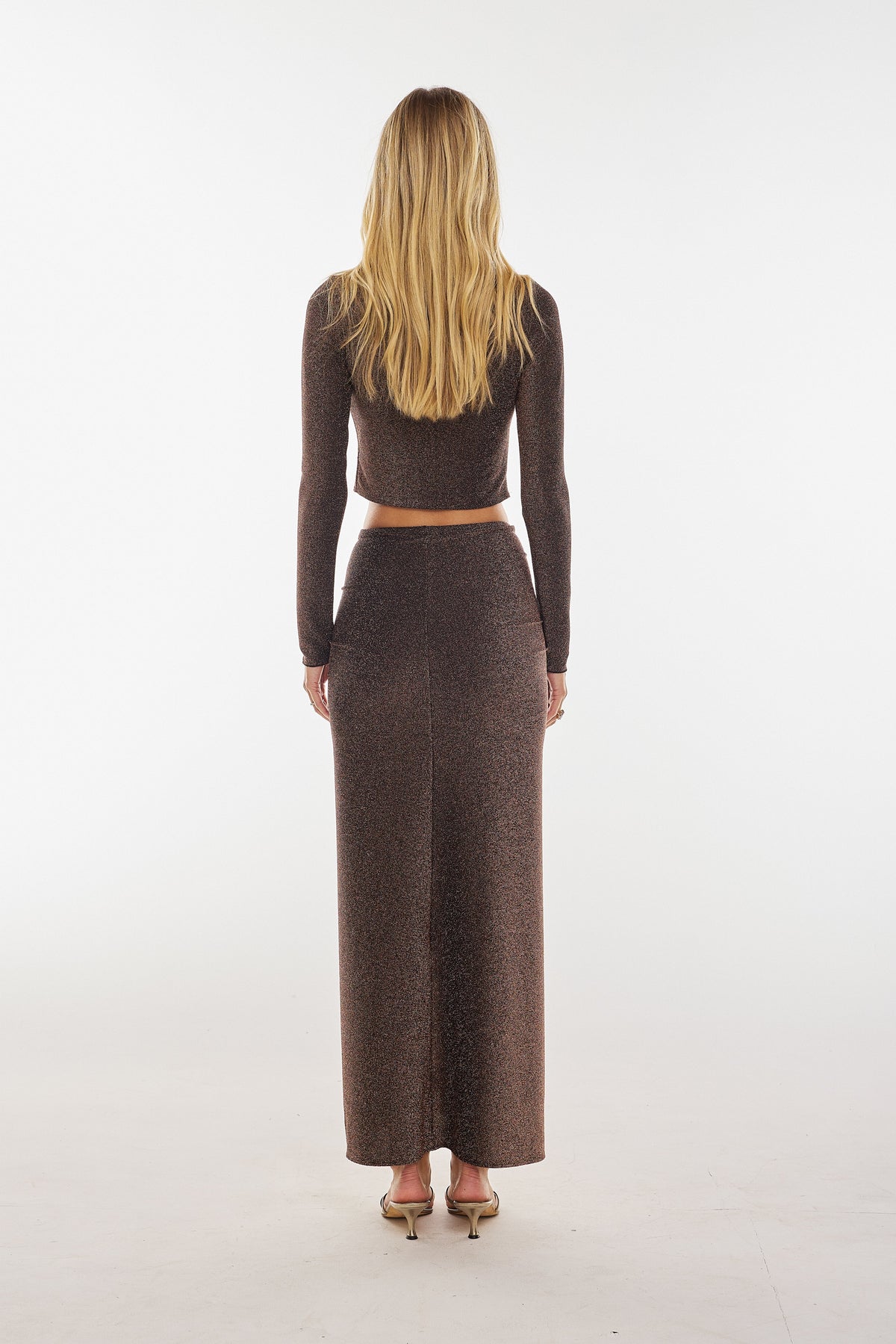 This is an image of Ida Top in Bronze - RESA featuring a model wearing the dress