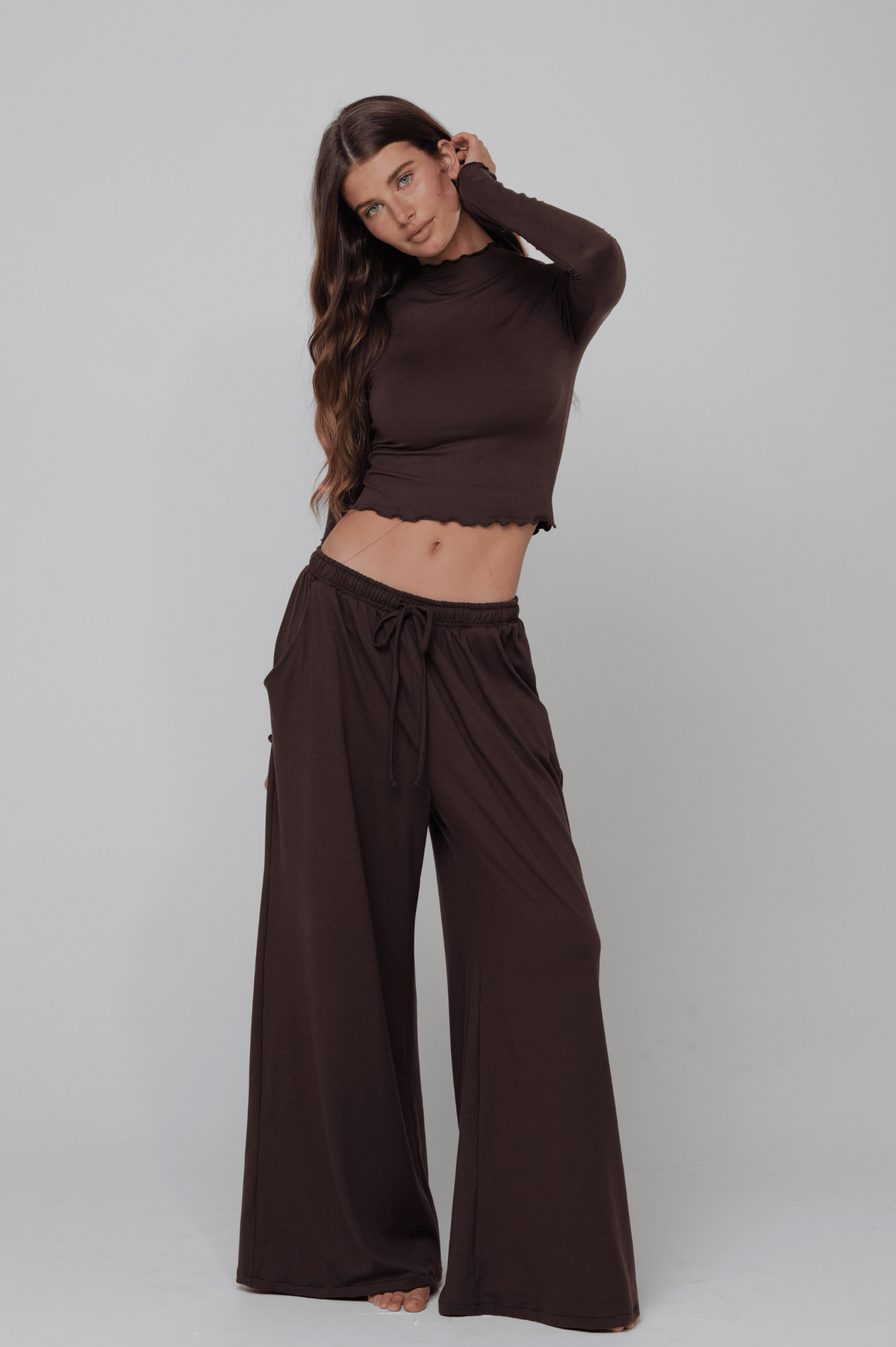 This is an image of Ida Top Second Skin in Cacao - RESA featuring a model wearing the dress
