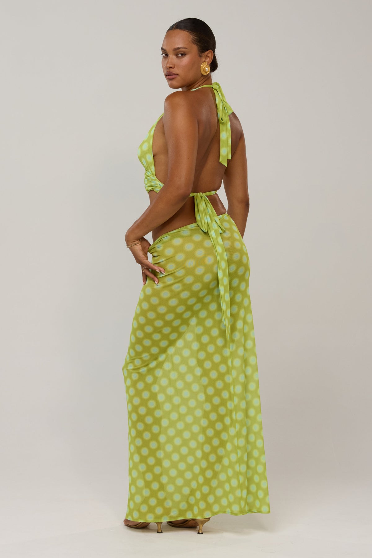 This is an image of Jane in Luma - RESA featuring a model wearing the dress
