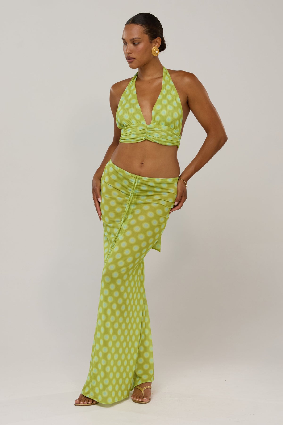 This is an image of Jane in Luma - RESA featuring a model wearing the dress