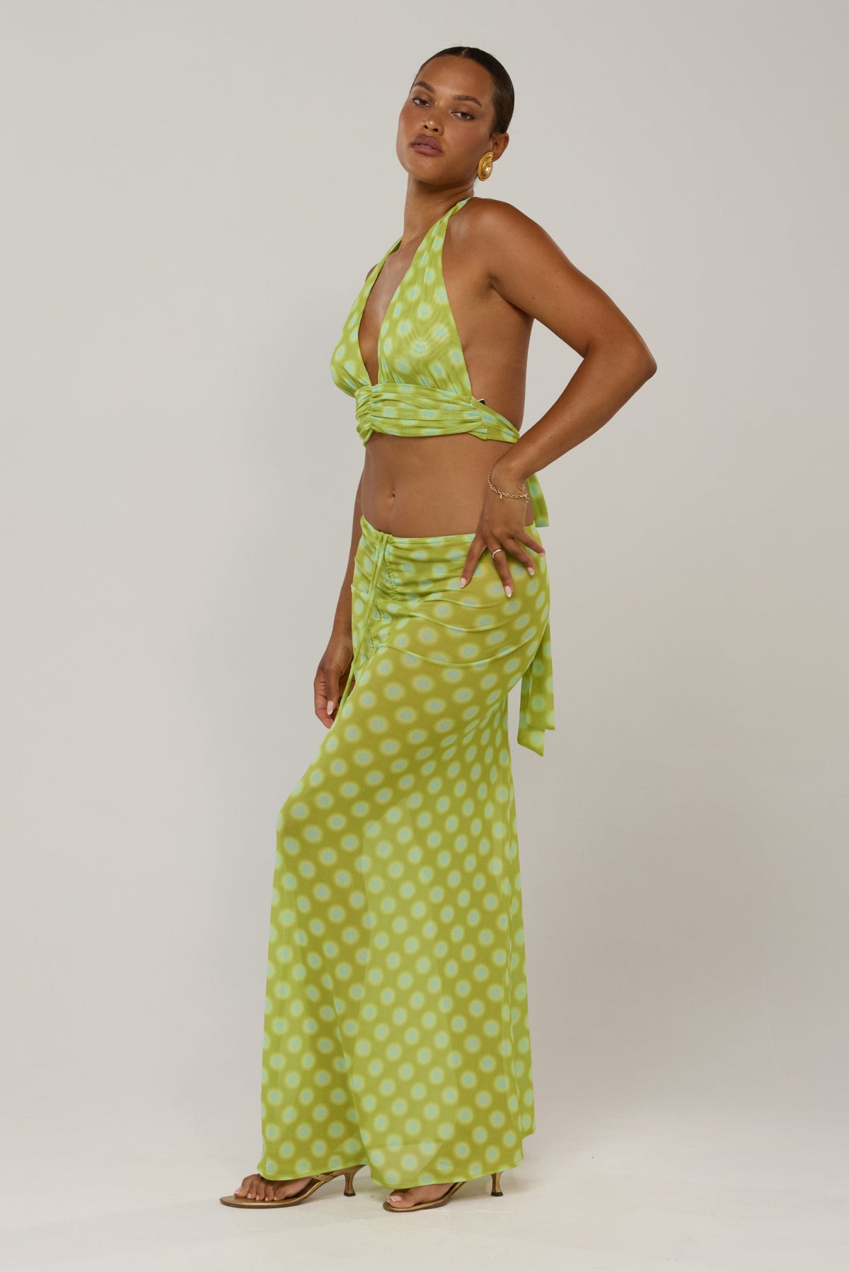This is an image of Jane in Luma - RESA featuring a model wearing the dress