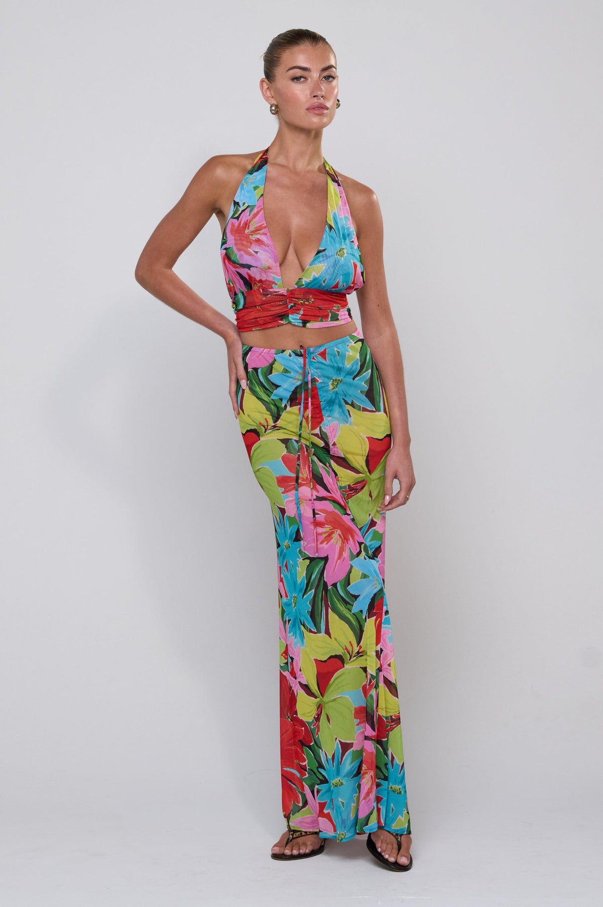 This is an image of Jane Top in Tropicana - RESA featuring a model wearing the dress