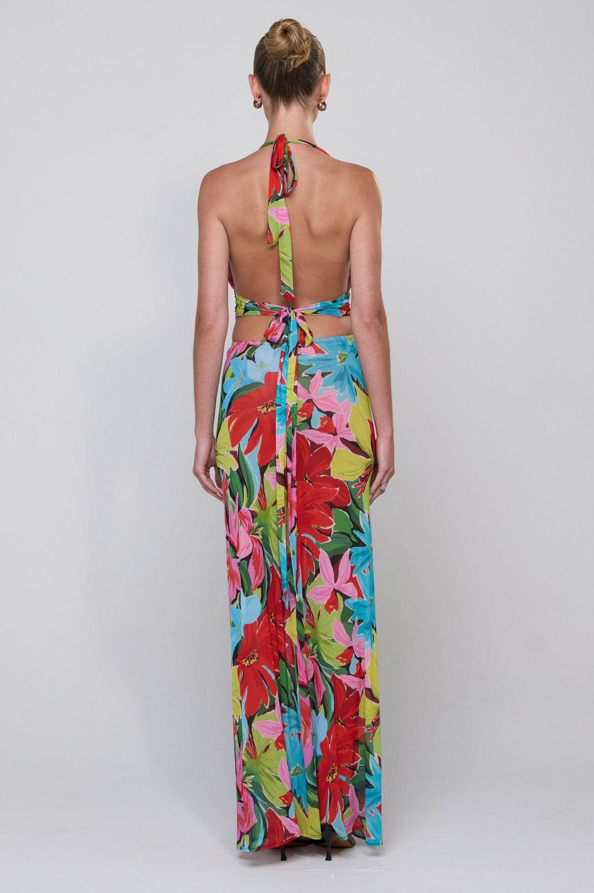 This is an image of Jane Top in Tropicana - RESA featuring a model wearing the dress