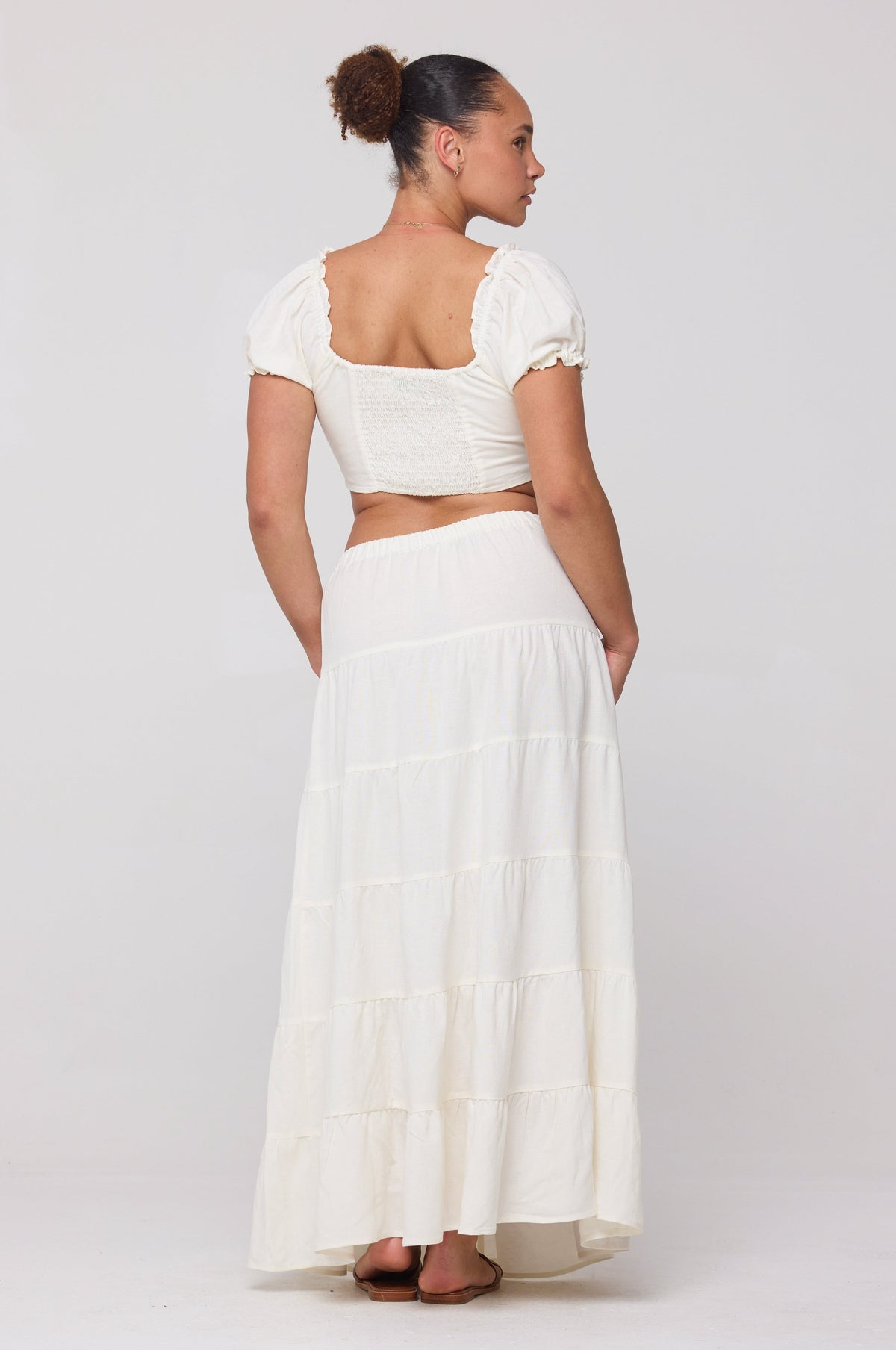 This is an image of Jess Top in White Linen - RESA featuring a model wearing the dress