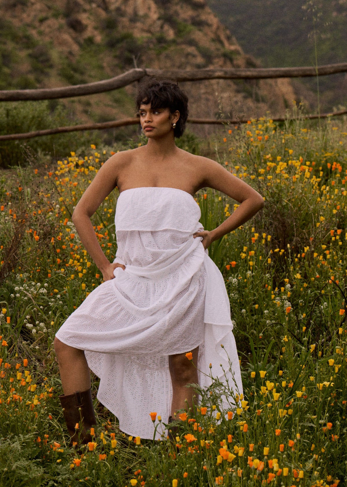 This is an image of Joni Dress in White Eyelet - RESA featuring a model wearing the dress