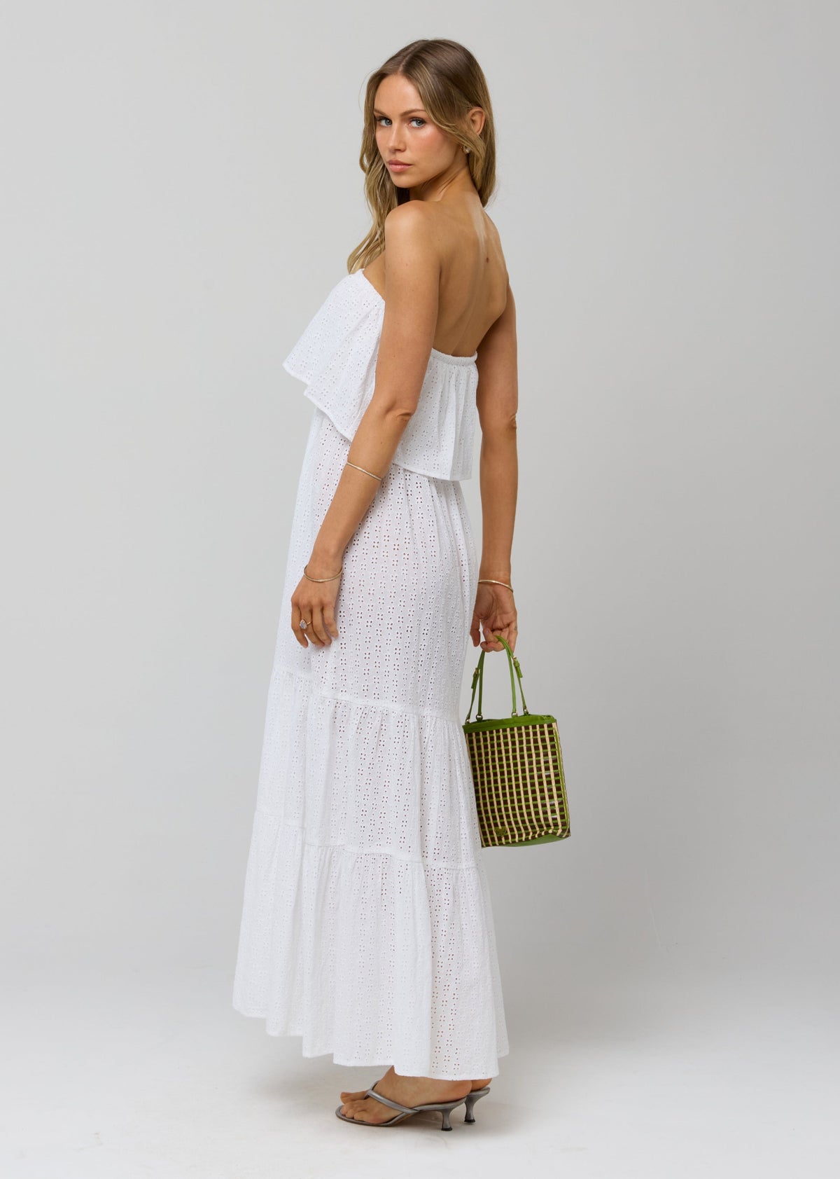 This is an image of Joni Dress in White Eyelet - RESA featuring a model wearing the dress