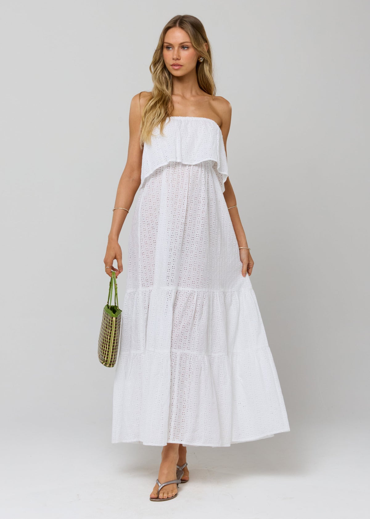 This is an image of Joni Dress in White Eyelet - RESA featuring a model wearing the dress