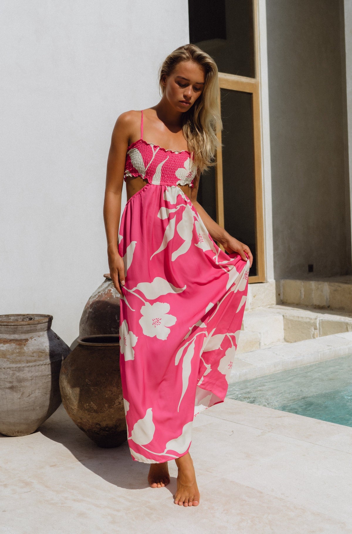 This is an image of Jordan Maxi in Zinnia - RESA featuring a model wearing the dress