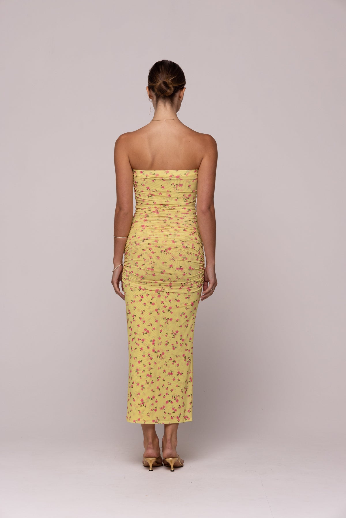 This is an image of KRISTINA DRESS IN HONEY - SAMPLE SALE - RESA featuring a model wearing the dress