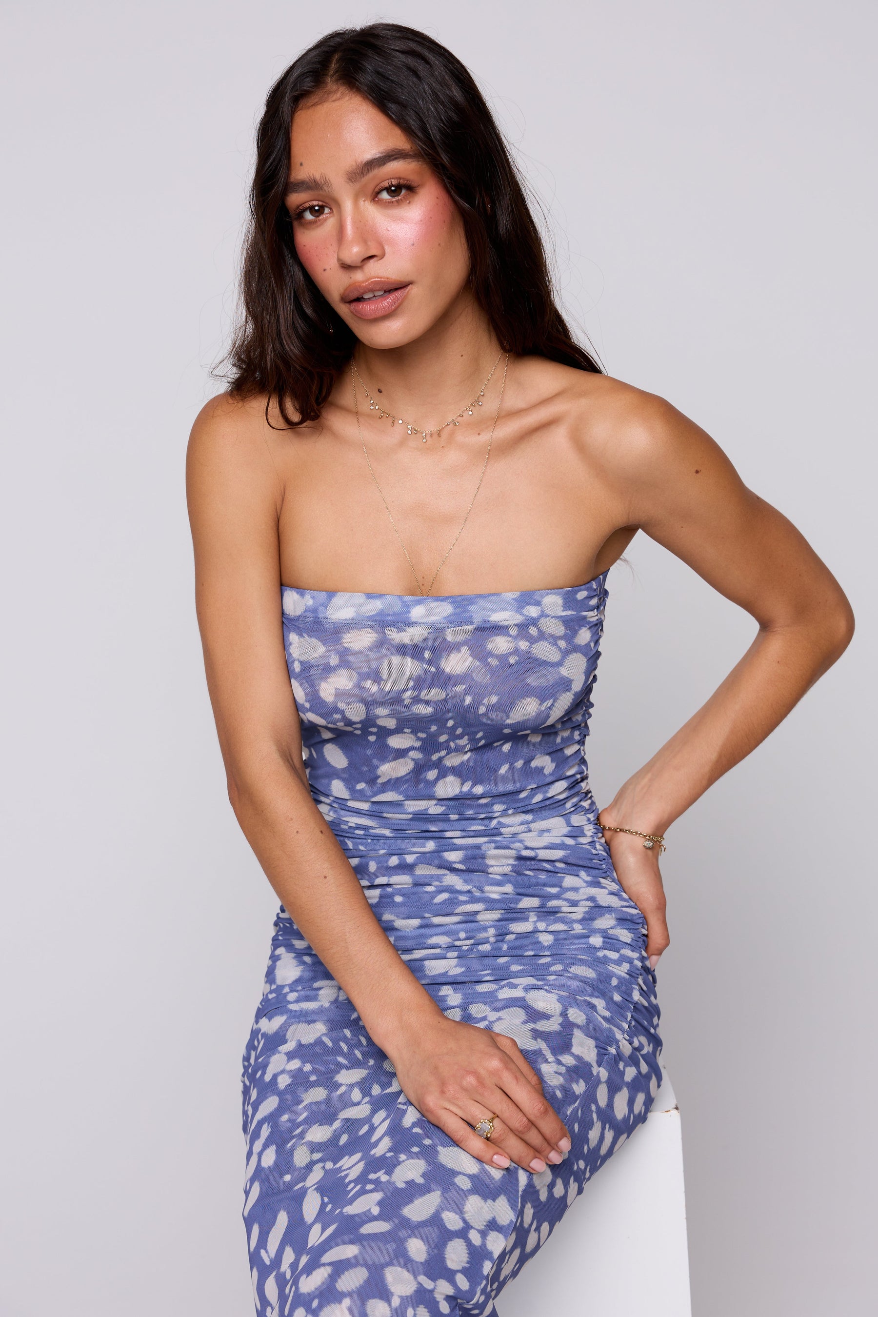 This is an image of Kristina Mesh Midi in Cove - RESA featuring a model wearing the dress