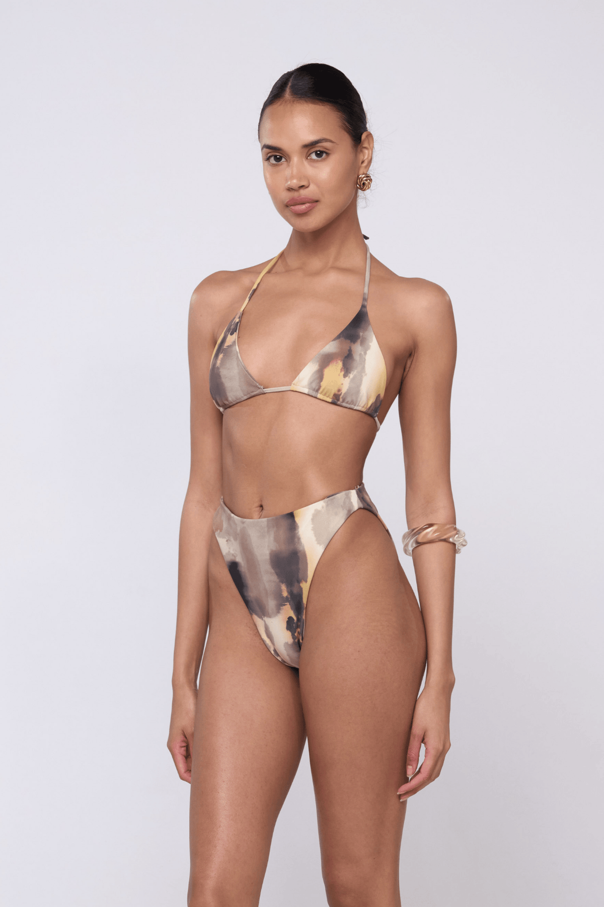 This is an image of Kyle Bikini Top in Dusk - RESA featuring a model wearing the dress
