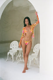 This is an image of Kyle Triangle Bikini Top in Keiko - RESA featuring a model wearing the dress
