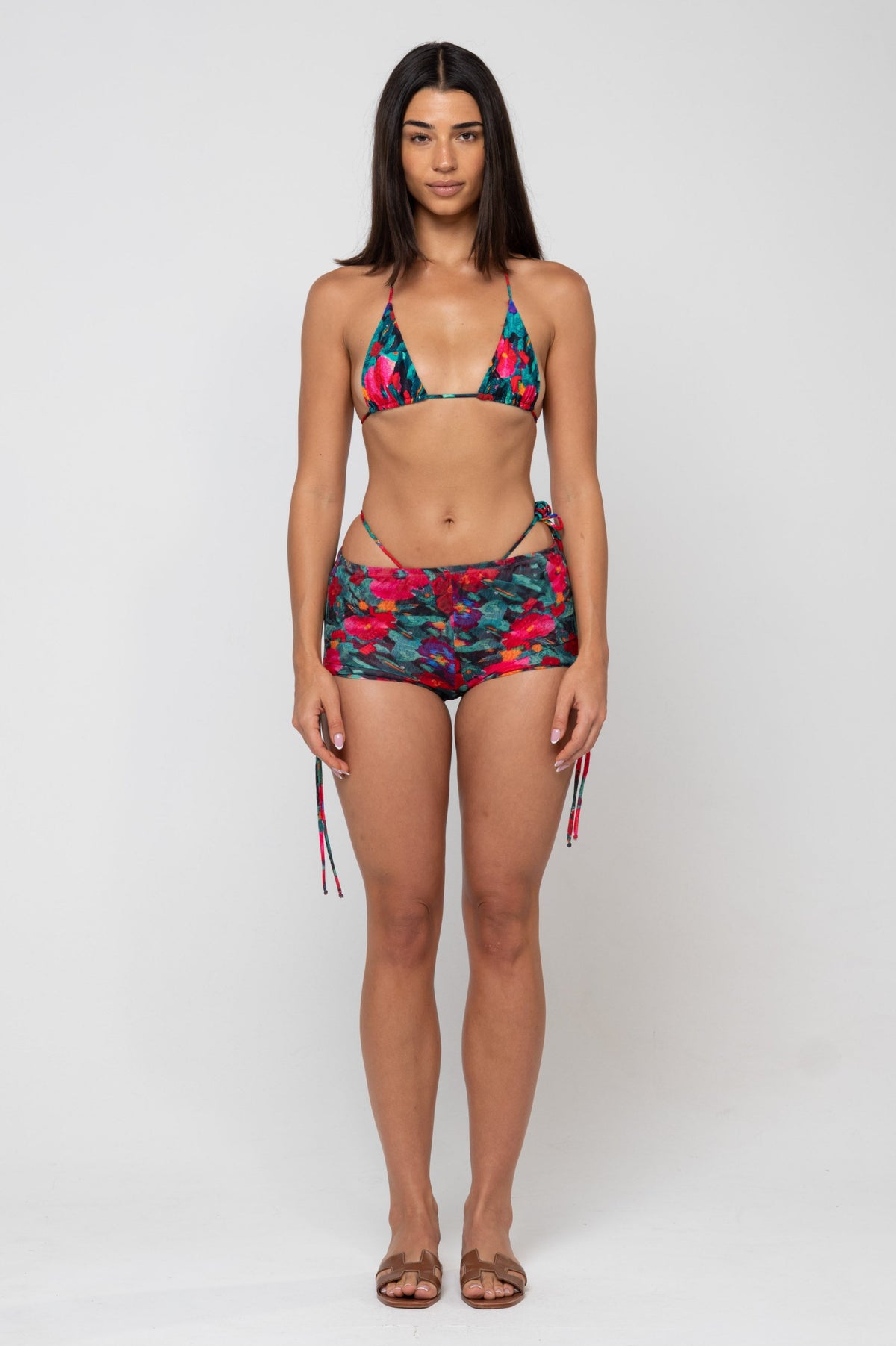 This is an image of Kyle Triangle Bikini Top in Resort - RESA featuring a model wearing the dress