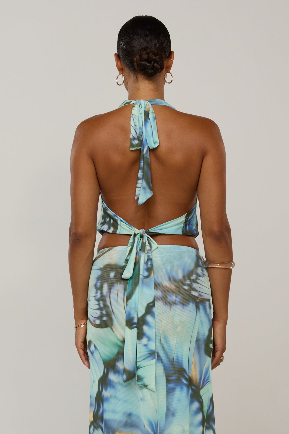 This is an image of Lea in Mariposa - RESA featuring a model wearing the dress