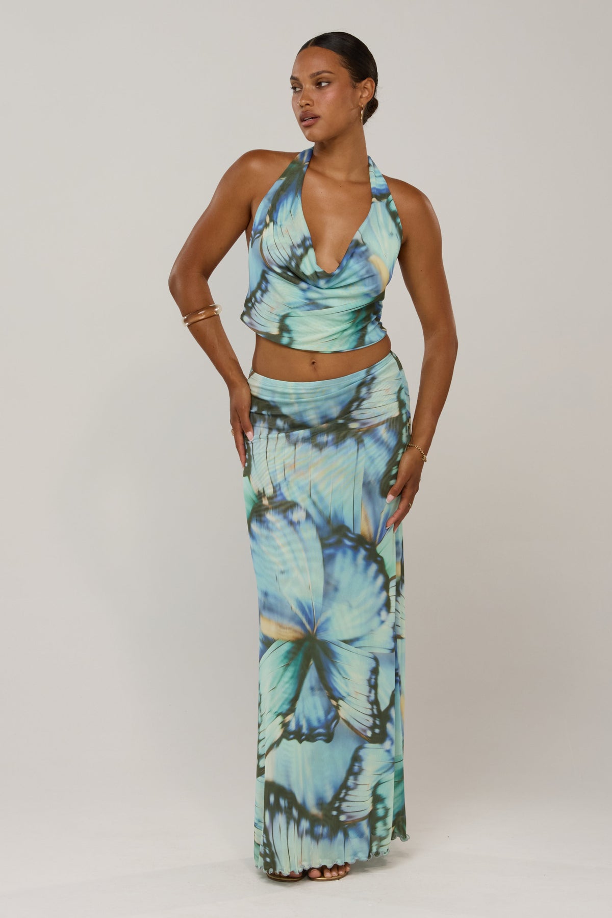 This is an image of Lea in Mariposa - RESA featuring a model wearing the dress