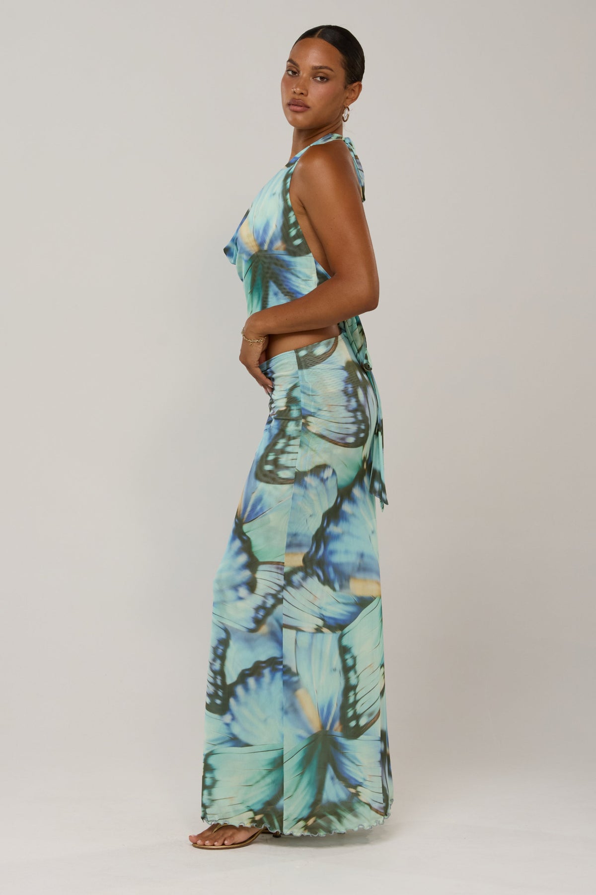 This is an image of Lea in Mariposa - RESA featuring a model wearing the dress
