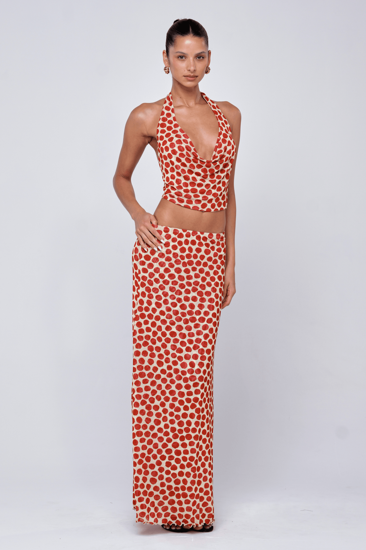 This is an image of Lea Top in Campari - RESA featuring a model wearing the dress