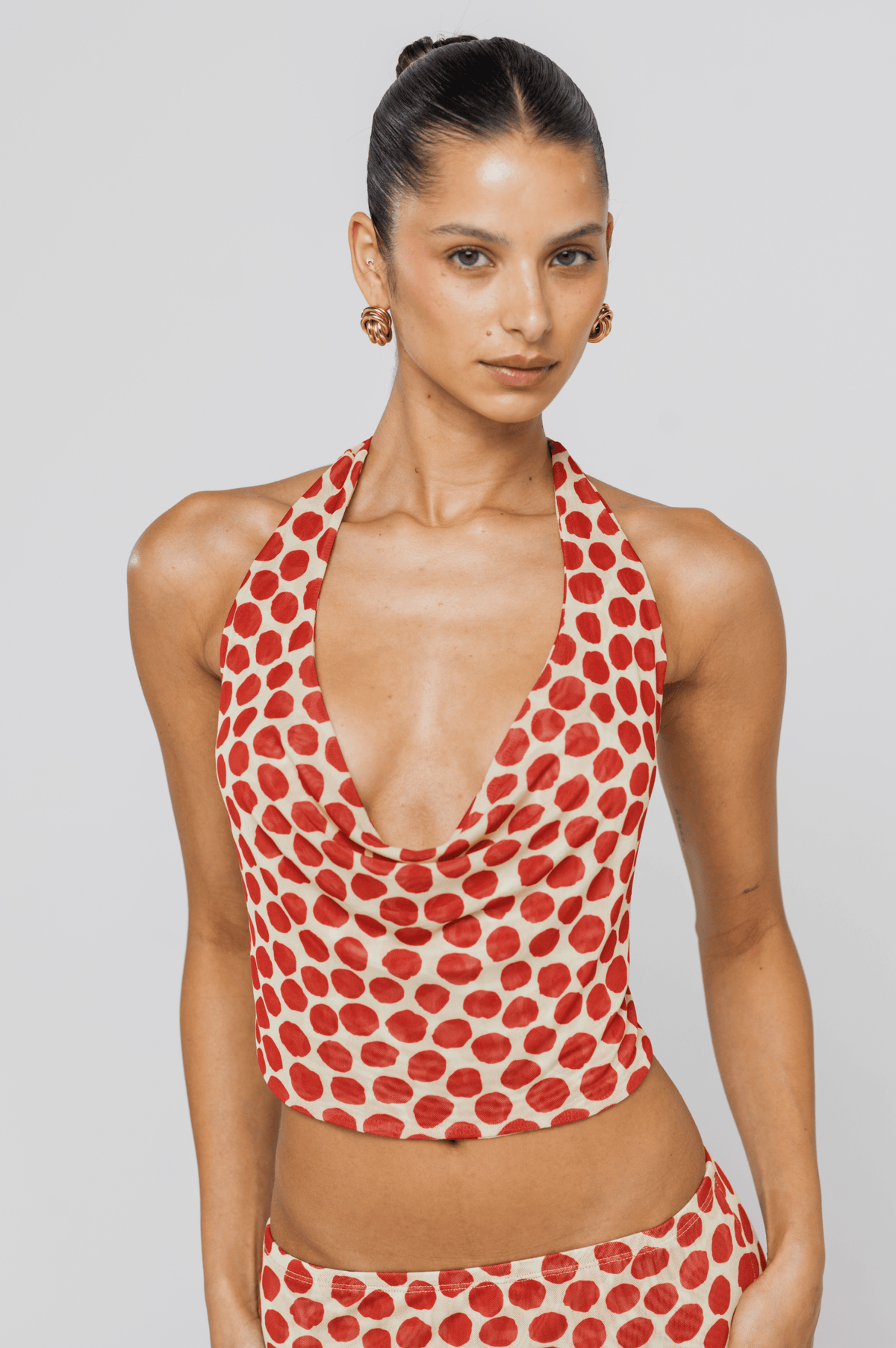 This is an image of Lea Top in Campari - RESA featuring a model wearing the dress