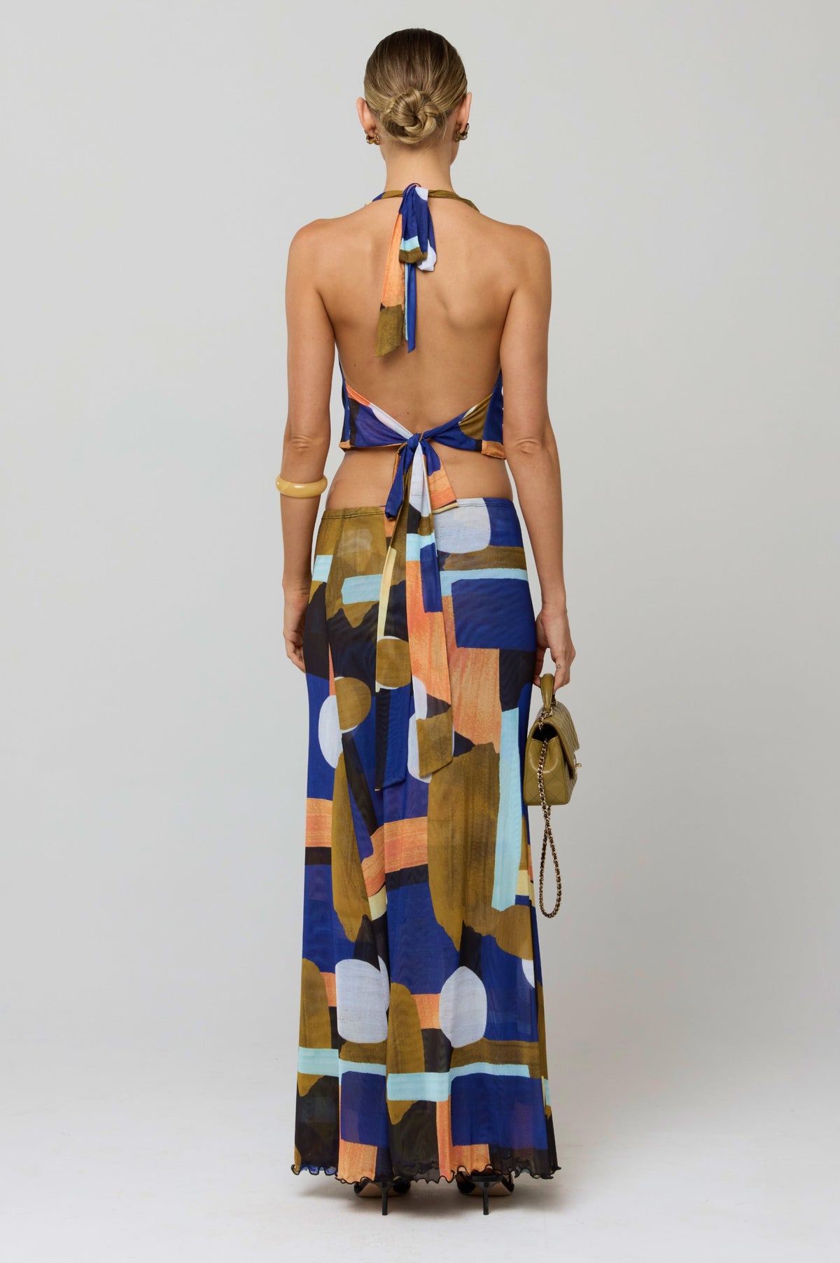 This is an image of Lea Top in Deco - RESA featuring a model wearing the dress