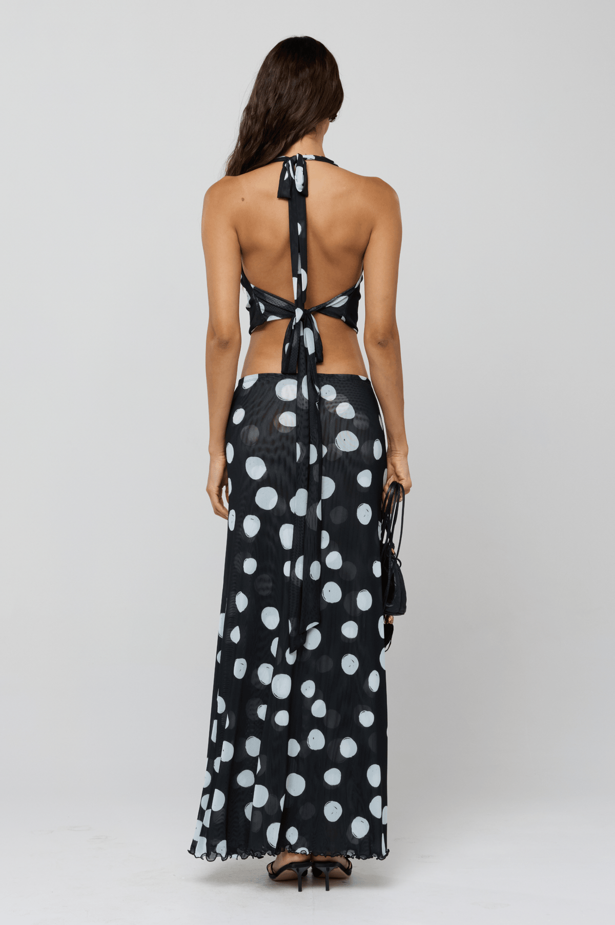 This is an image of Lea Top in Vogue - RESA featuring a model wearing the dress