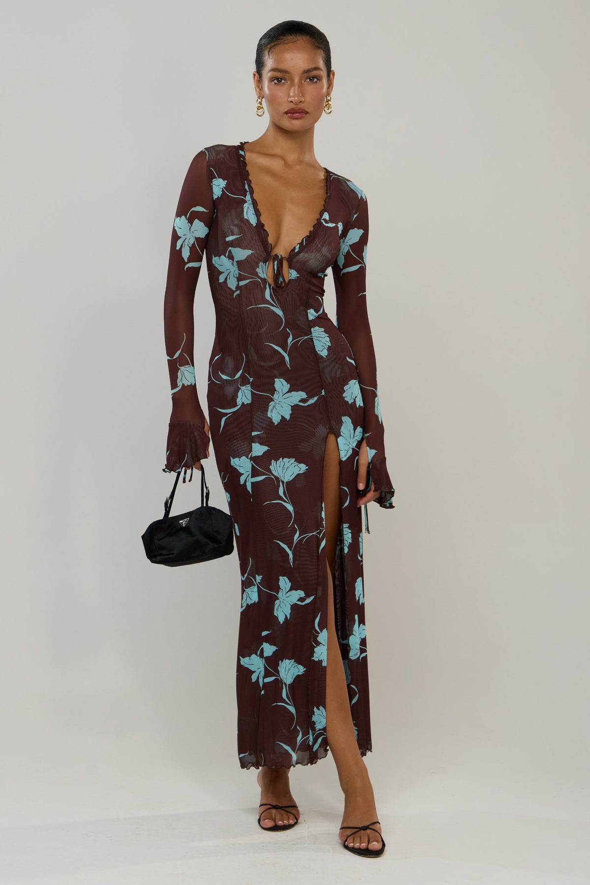 This is an image of Lennon in Agave - RESA featuring a model wearing the dress