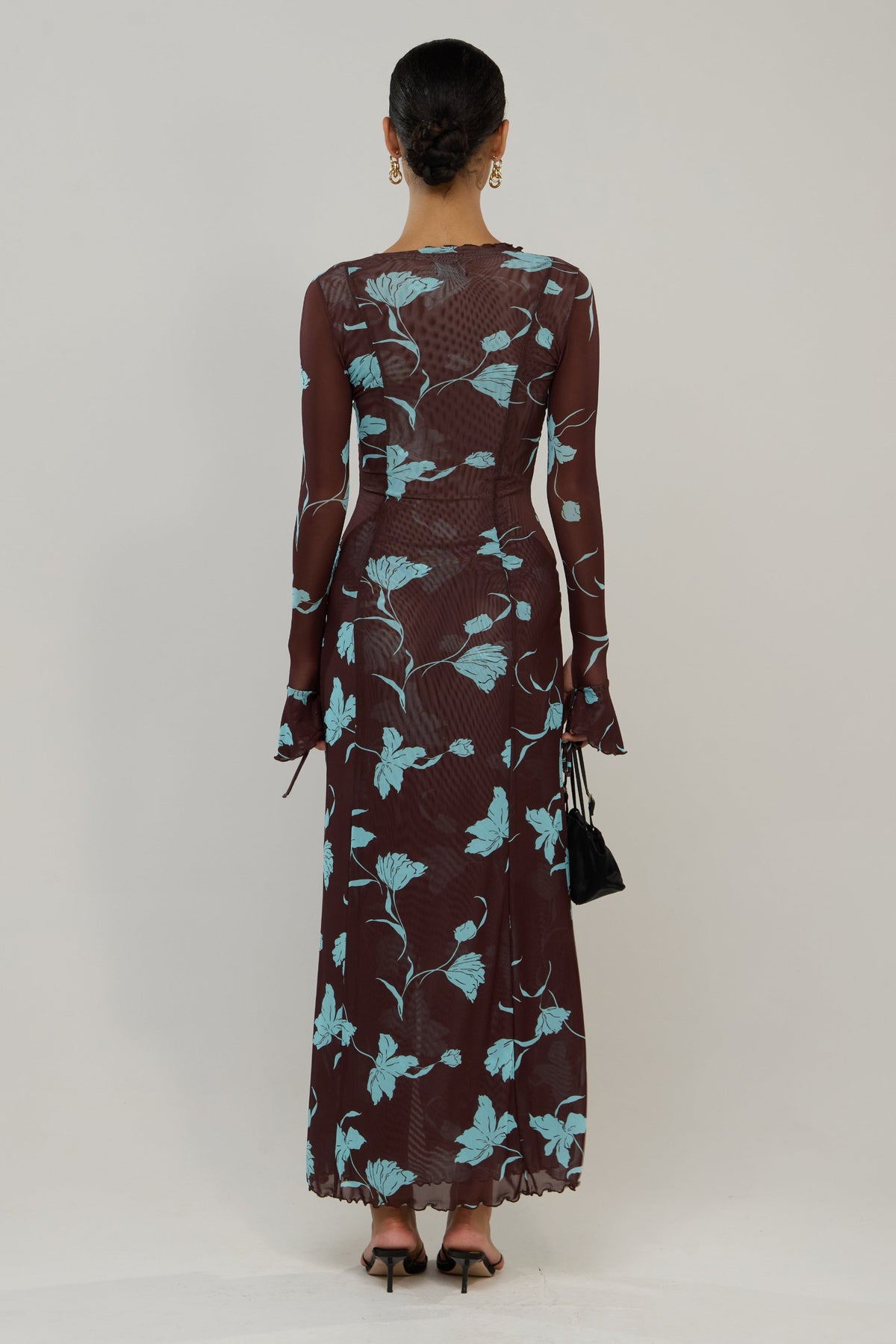 This is an image of Lennon in Agave - RESA featuring a model wearing the dress