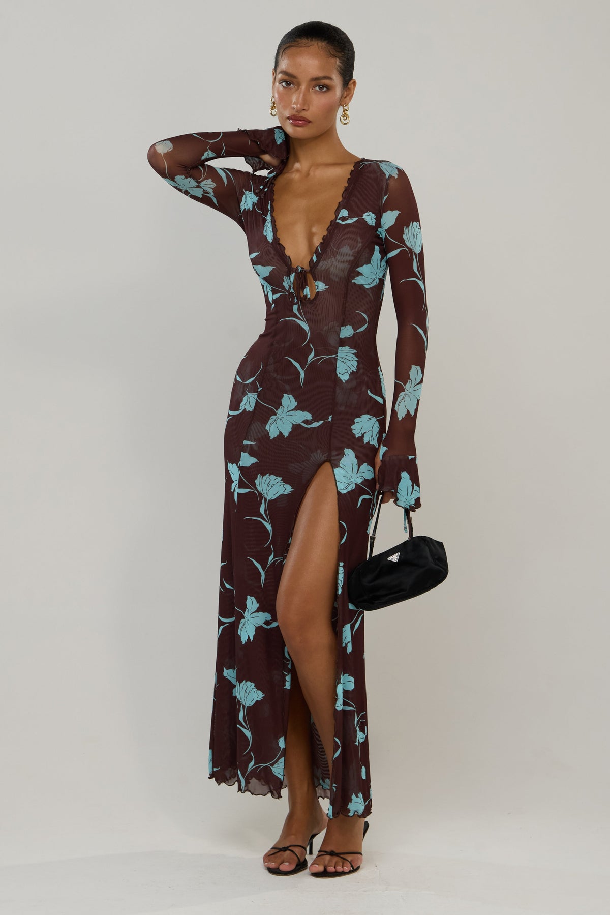 This is an image of Lennon in Agave - RESA featuring a model wearing the dress