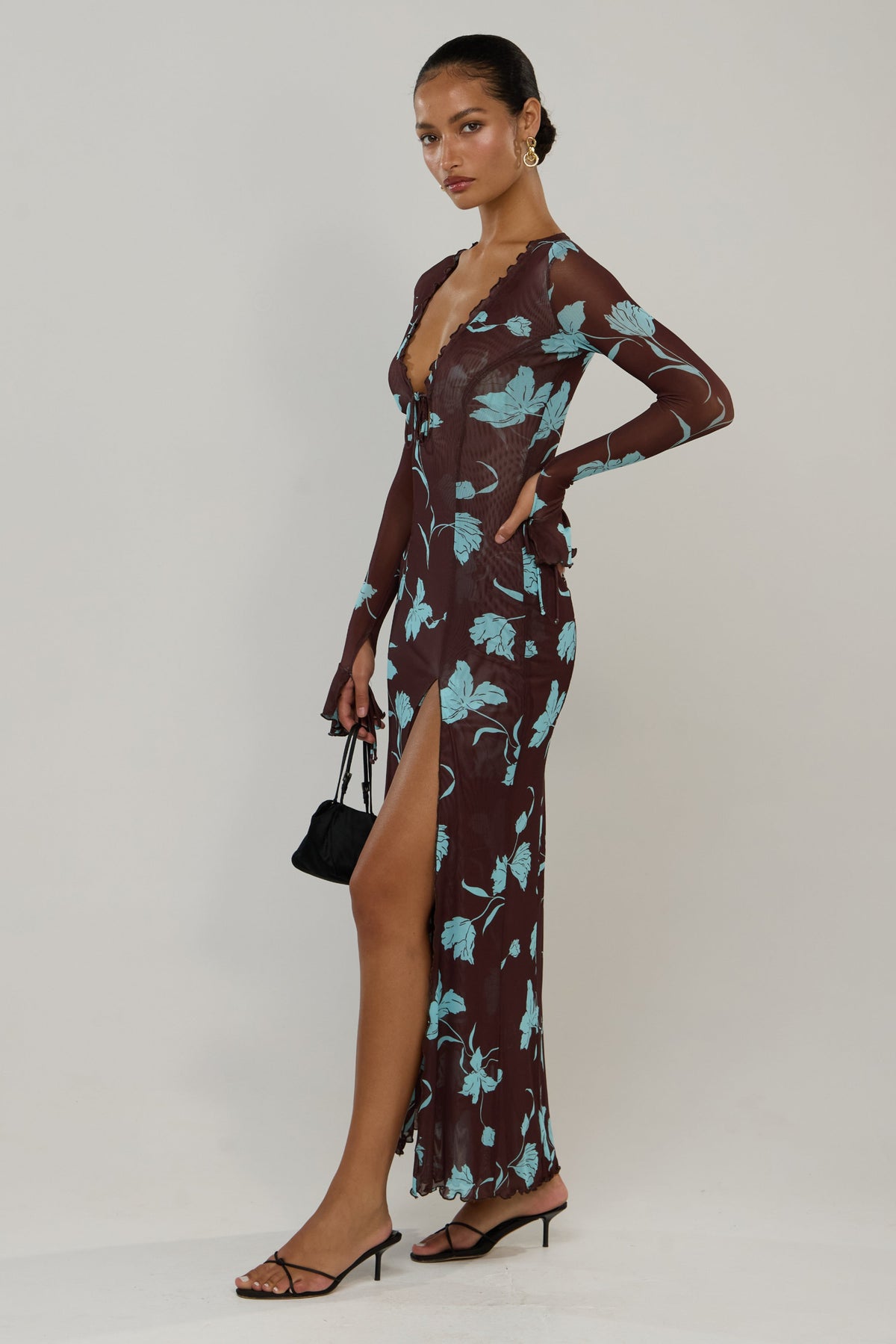 This is an image of Lennon in Agave - RESA featuring a model wearing the dress