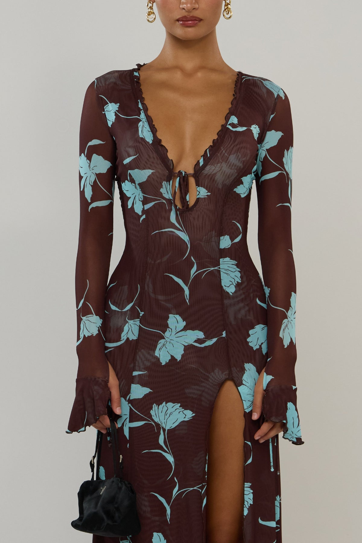 This is an image of Lennon in Agave - RESA featuring a model wearing the dress