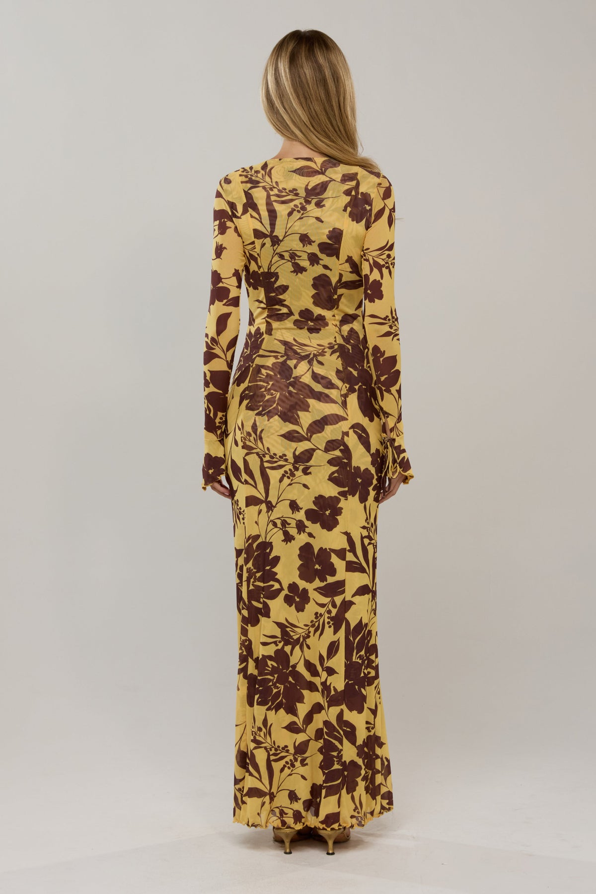 This is an image of Lennon in Mesa - RESA featuring a model wearing the dress