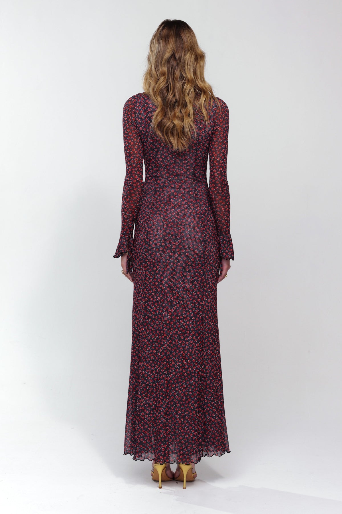 This is an image of Lennon Maxi in Besos - RESA featuring a model wearing the dress