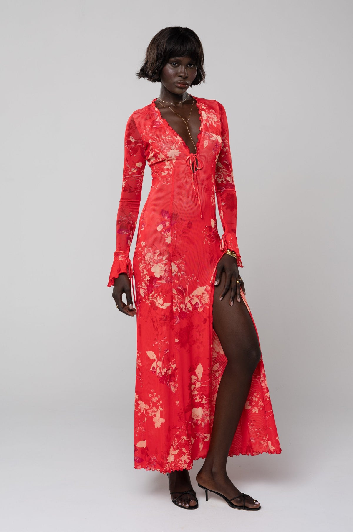 This is an image of Lennon Maxi in Blossom - RESA featuring a model wearing the dress