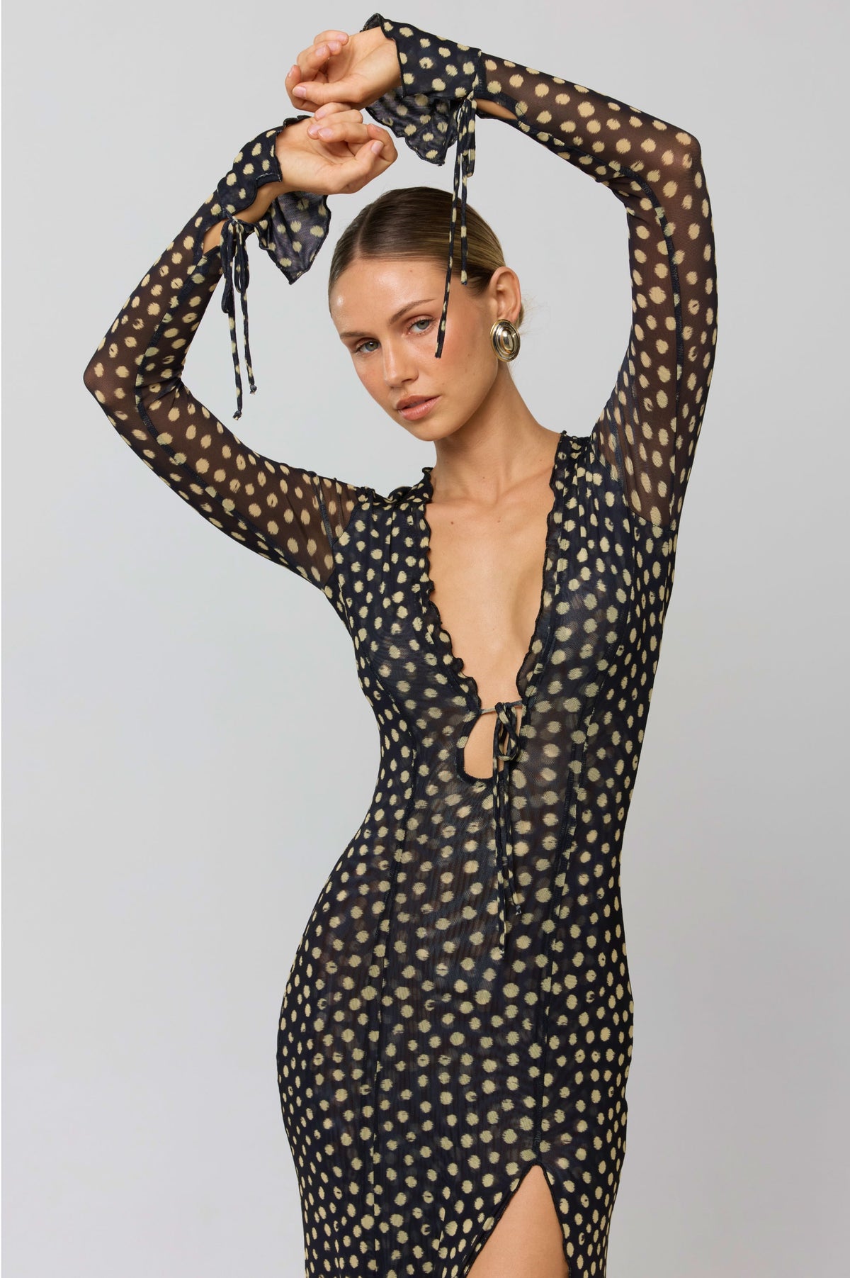 This is an image of Lennon Maxi in Celeste - RESA featuring a model wearing the dress