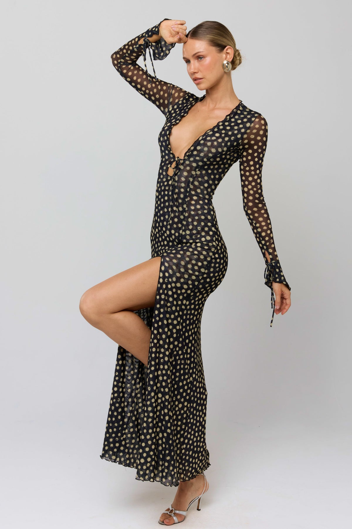 This is an image of Lennon Maxi in Celeste - RESA featuring a model wearing the dress