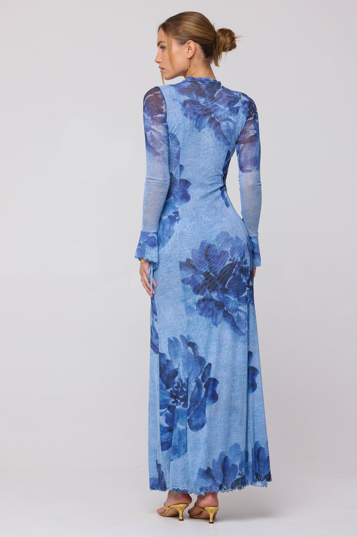 This is an image of Lennon Maxi in Indigo - RESA featuring a model wearing the dress