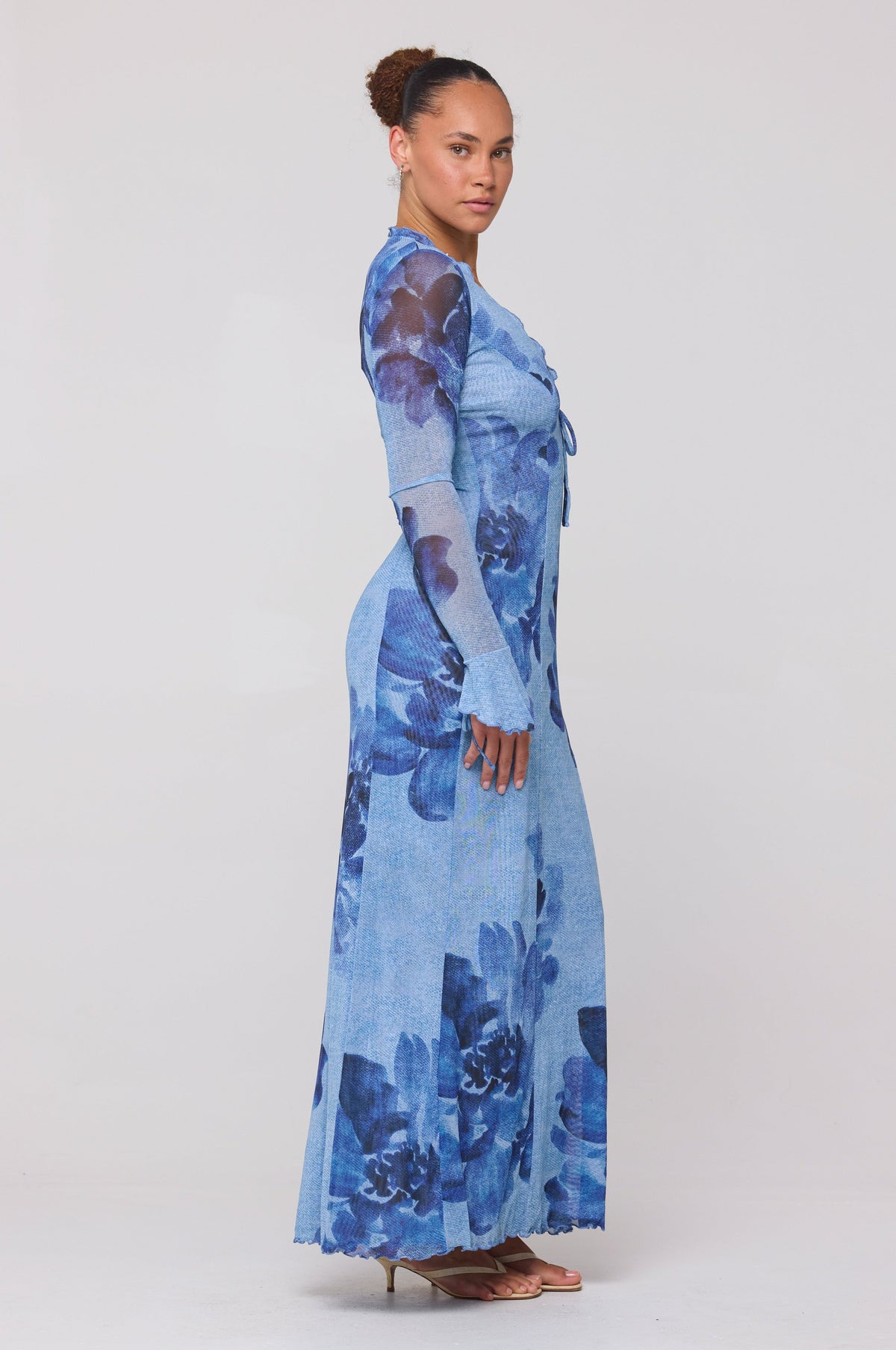 This is an image of Lennon Maxi in Indigo - RESA featuring a model wearing the dress