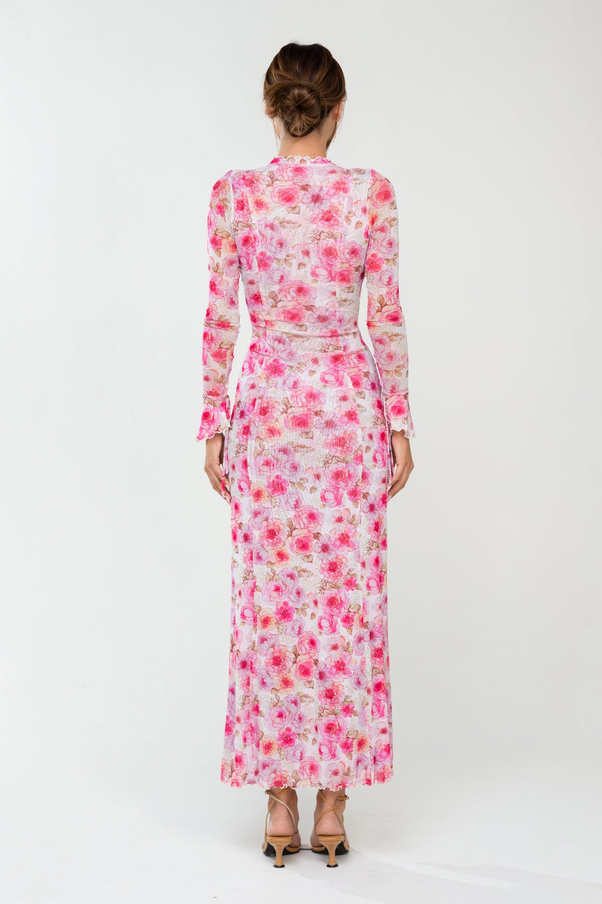 This is an image of Lennon Maxi in Petal - RESA featuring a model wearing the dress