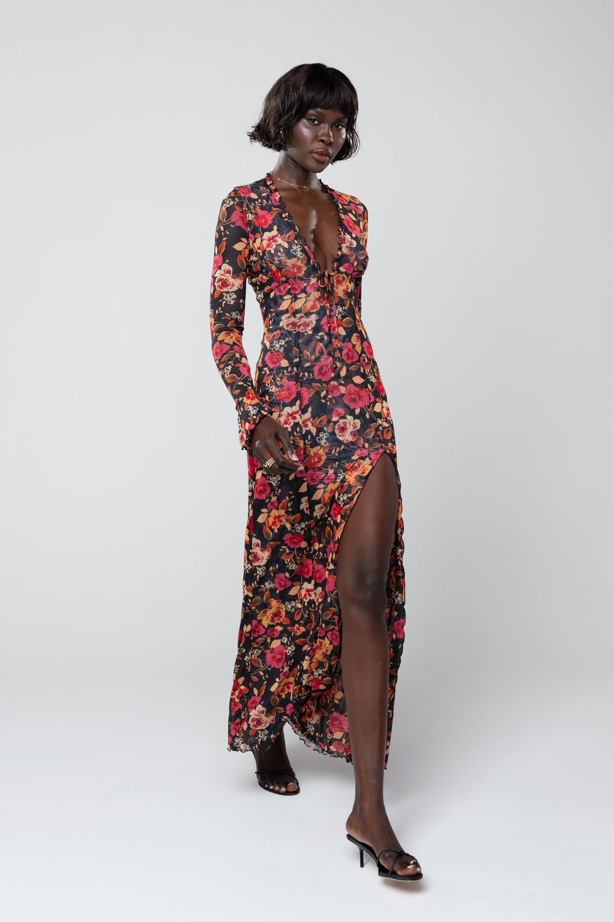 This is an image of Lennon Maxi in Rosie - RESA featuring a model wearing the dress