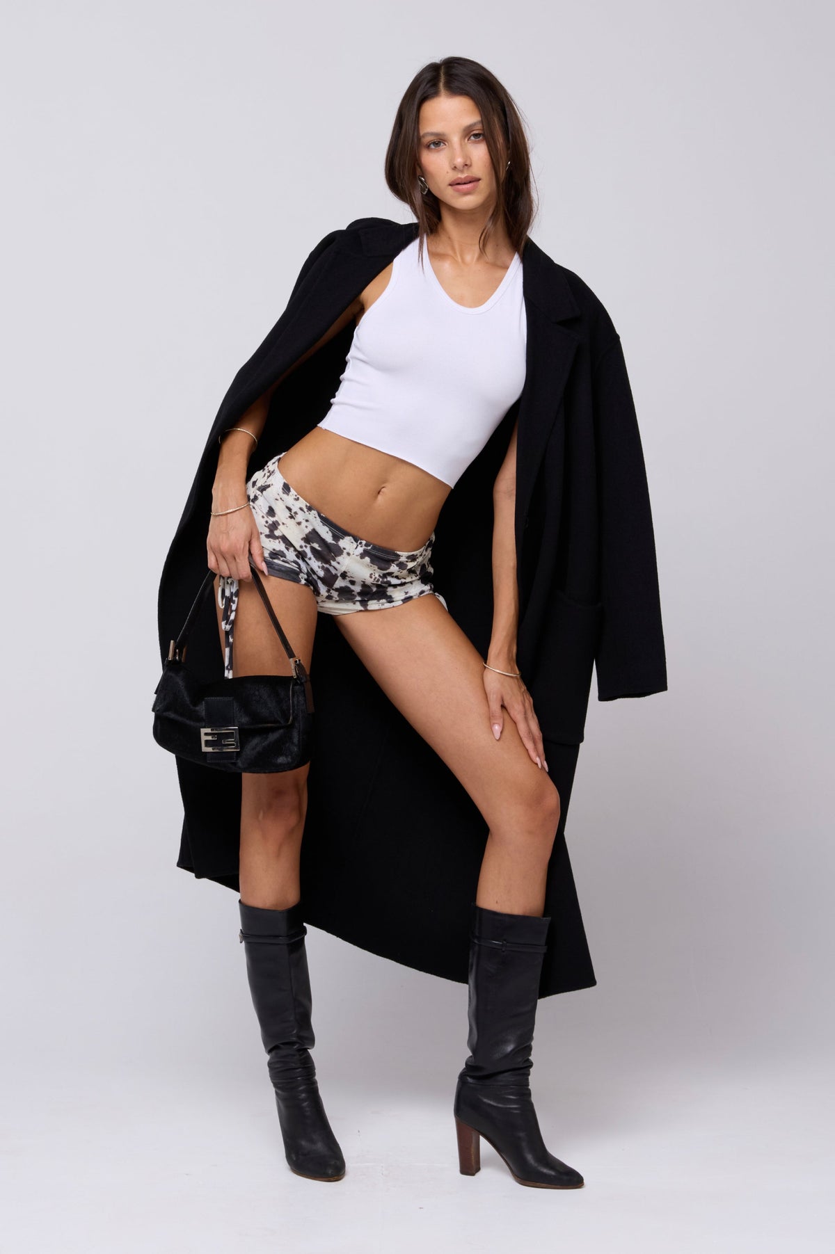 This is an image of Lina Short in Hide - RESA featuring a model wearing the dress