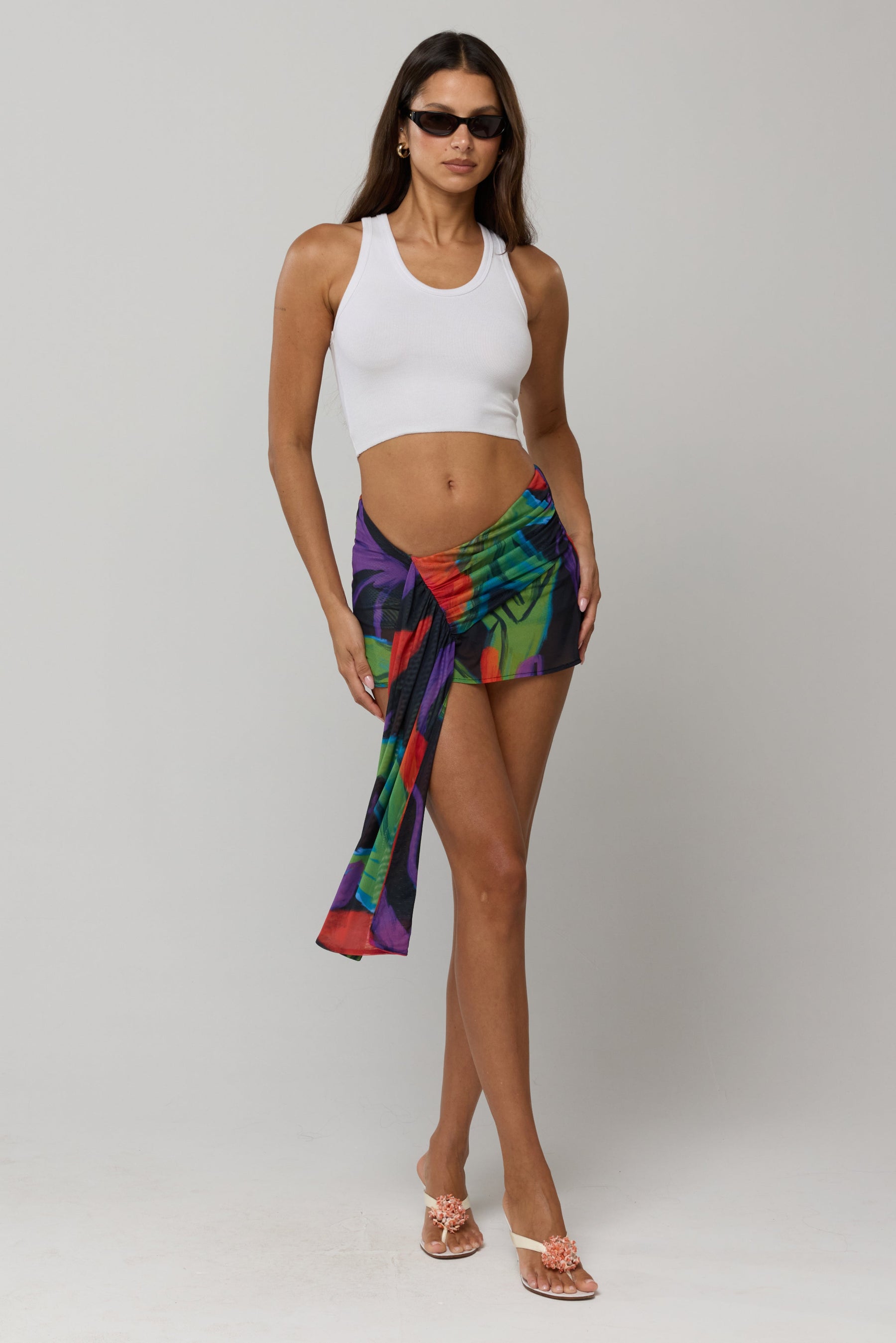 This is an image of Lucy Mini Skirt in Mai Tai - RESA featuring a model wearing the dress