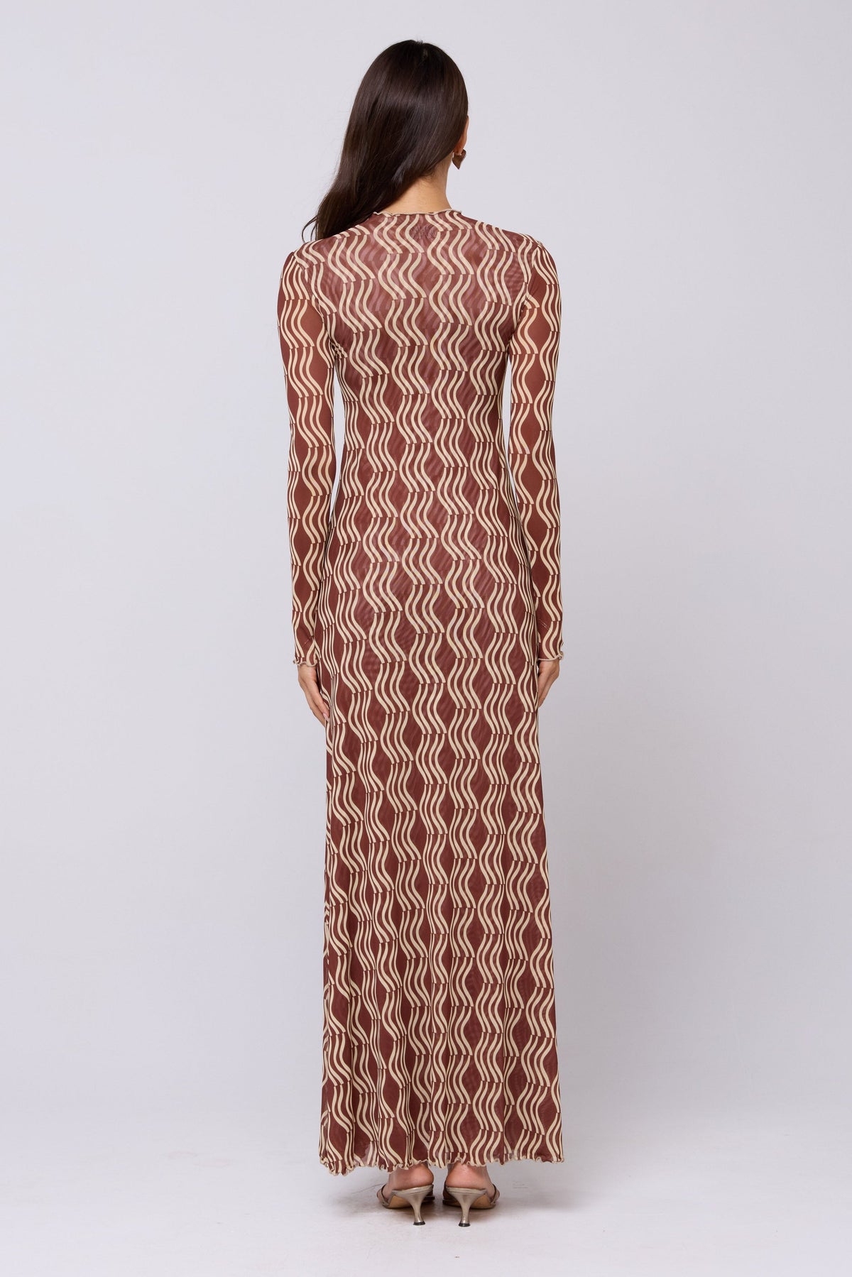 This is an image of Lyon Dress in Coco - RESA featuring a model wearing the dress