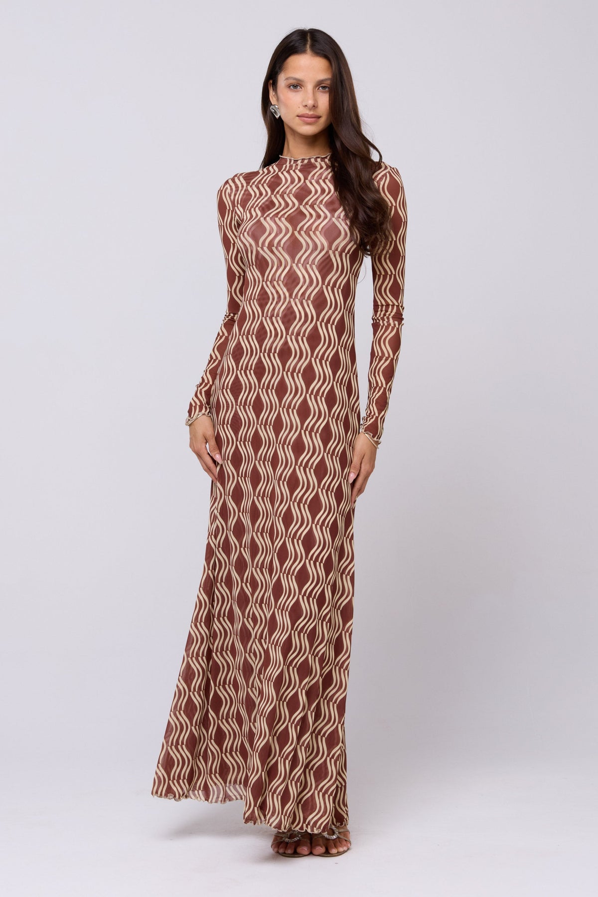 This is an image of Lyon Dress in Coco - RESA featuring a model wearing the dress